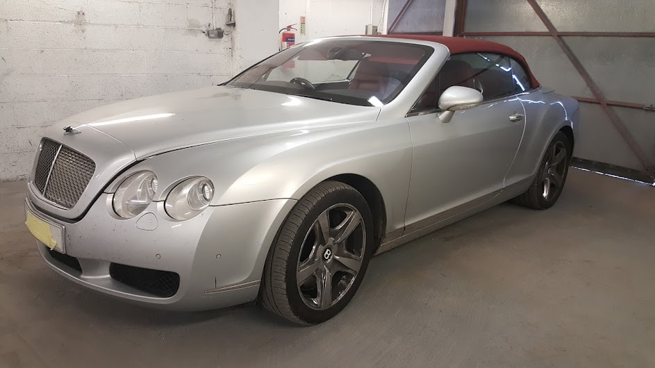 Silver Bentley Continental GTC in for bodywork